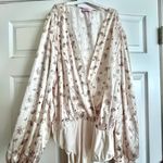 Pink Lily Cream Floral Bodysuit Photo 0