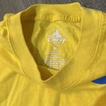 Disneyland resort logo soft yellow blue longsleeve tee shirt medium EUC Photo 3