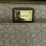 Calvin Klein purse in tan/brown leather small.  GUC. Photo 1