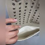 Silver crossbody purse with‎ silver chain and stud design Photo 3