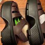 Crocs  Women's Flats in Dark Brown and Black Photo 1