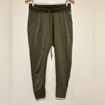 FP Movement by Free People Sunny Skinny Joggers in Army Green Size Medium Photo 1