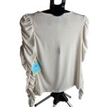 Cynthia Steffe Cece creme colored and gold specs ruffled statement sleeve blouse size small NWT Photo 4