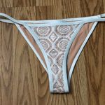 Ris-k Nude And White Bikini Bottom Photo 0