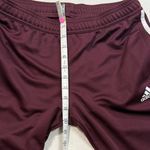 Adidas  Maroon Track Pants with White Stripes Photo 3