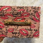 Betsey Johnson NWT  I.D. Holder. Photo 1