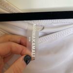 Norma Kamali Revolve one-shoulder top Photo 1