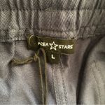 Area Stars NWT Women’s Navy Blue Ali Cropped Drawstring Cut Hem Pants Large Photo 8