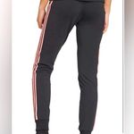 Adidas Black Track Pants with Pink Accents Photo 1