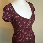 PacSun ’s Me to We Women’s Cropped Floral Print Cap Sleeve Zip Front Ribbed Top Photo 1