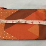 Ipsy Geometric Orange and Brown Small Pouch Photo 4