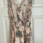 Vestique Romper Photo 1