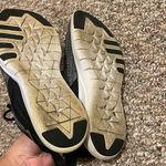 Nike Womens Flex TR9 Black with Gold Athletic Sneakers Shoes Photo 5