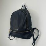 Michael Kors Black Pebble Leather Rhea zip Backpack. 3 pockets 1 zippered inside Photo 1