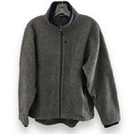 Vtg Vintage Sherpa Fleece Grey Sz Lg Deep Pile Outdoors Pullover Zip Chest 42” Length 25” Shoulder Width 17” Bottom Opening 21” Sleeve Length 23” Get ready for your next adventure with this vintage L.L. Bean jacket. Made with durable polyester outer shell material and a cozy fleece fabric type, this windbreaker is perfect for any outdoor activity. The solid gray color and classic design make it suitable for travel, workwear, or casual occasions. Zip up the closure and enjoy the deep pile warmth of this sherpa fleece jacket. It's a great find for any hiking enthusiast or vintage clothing collector. This jacket comes in size L and is labeled Large making it a versatile addition to any wardrobe. Photo 1
