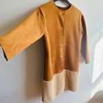 ZARA β
Coat with Faux Suede/ Fur bottom trim - Tan/Cream β
Photo 7