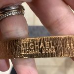 Michael Kors Brown & Bronze Monogram PVC Belt Bag. Photo 4