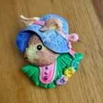 Vintage ceramic bunny rabbit with a bonnet pin brooch Brown Photo 0
