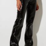 Motel Rocks Black Flared Pants with High Waist and Glossy Finish Photo 3