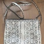 BCBGeneration Snakeskin Crossbody Photo 1