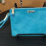 Cole Haan  medium zip pouch Photo 0