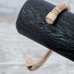 Gold Tone Cuff Bracelet with Light Pink Gem Ends Photo 2