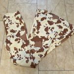 Altar'd State NWT Cow print bell bottoms Photo 1