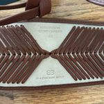 B-low the Belt  brown belt Photo 2