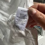 Vigoss  Faux Tie Front Sleeveless Top In White Photo 6