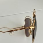 Miu Miu New with tags  56RS Sunglasses. Gold butterfly frame Photo 5
