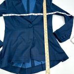 CAbi Blazer Womens 6 Dark Blue Windowpane Check Plaid Casual Jacket Career #5475 Dark blue windowpane check plaid blazer is single-breasted with one button closure. Unlined. Women’s size 6. Polyester/rayon/spandex blend; machine washable. Garment has been cleaned per manufacturer instructions. SEE PHOTOS FOR DETAILS AND APPROXIMATE FLAT LAY MEASUREMENTS TO DETERMINE FIT. Photo 7