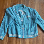 Taylor Swift  1989 TV Cardigan Photo 0