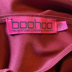 Boohoo  Maroon sleeveless mini dress with skater skirt and deep v neck Photo 6