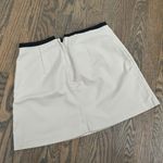 H&M khaki tan high waisted tailored mini skirt with black waist lining detail Photo 6