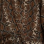 Womens boutique top size medium never worn Photo 1