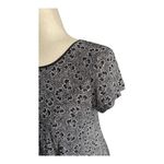 Urban Outfitters -SILENCE + NOISE Adorable black and white fit and glare dress, black tattered gem, short sleeves, back zipper, excellent condition, size small Measurements: Bust: armpit to armpit 16 inches Length: shoulder seam to bottom 29 inches Photo 5