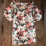 Bebe size 4 of the shoulders floral dress with flair sleeves. Photo 3