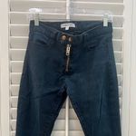 Elizabeth and James Black Jeans Photo 1