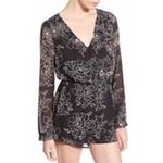 ASTR  Black and White Floral Romper with Bell Sleeves Photo 1