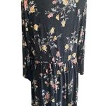 Torrid -SUPER SOFT BABYDOLL TOP WITH PINK & GOLD FLOWERS-WOMENS SIZE 1X Black babydoll top with pink and gold flowers, long sleeves, lace up bodice, lots of stretch, 95% rayon and 5% spandex, excellent condition Measurements: Bust: armpit to armpit 24 inches Length: shoulder seam to bottom Front: 29 inches Back: 33 inches Photo 2