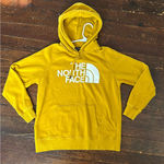 The North Face  Yellow Hoodie Sweatshirt Photo 0