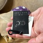 NWT American Flag Criss Cross Ponytail Hat Tie Dye Purple Star Print Photo 3