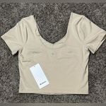 Lululemon NWT Prosecco Align Nulu Tee size 10 Photo 0
