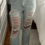 Forever 21 Light Wash Ripped Jeans Photo 0