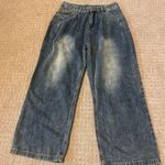 Boutique Medium Denim Wash High Waist Pleated Wide Leg Jeans Photo 0