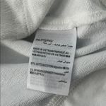 Karen Scott  White Vest Photo 13