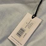 We Wore What  Cropped Denim Top Flare Sleeve Photo 4