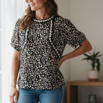 Ellison  Animal Print Blouse Size S Short Sleeve Textured Trim Photo 0