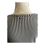 Michael Kors beautiful tunic top, black and white stripes. Long sleeves, lightweight, two tier ruffle bottom, excellent condition, size medium Measurements: Bust: armpit to armpit 20 inches Length: shoulder seam to bottom 29 inches Photo 6