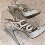 Carlos Santana  high heels Photo 2